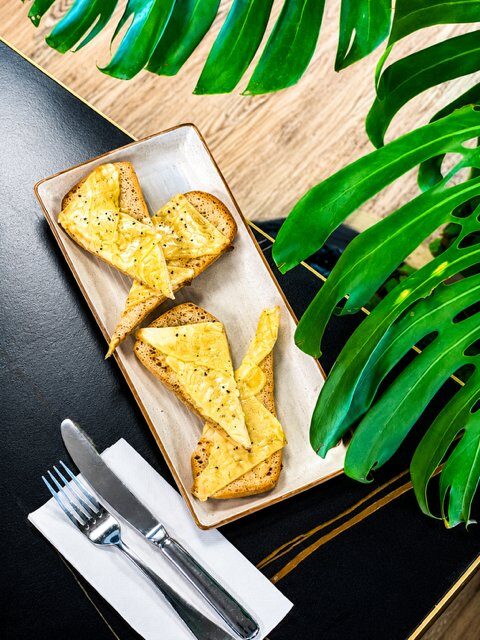 Vegan cheesy garlic bread on baguette